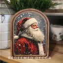 ARCHED SANTA IN SNOW ART